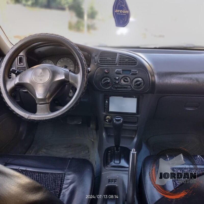 سيارة متسوبيشي ٩٩