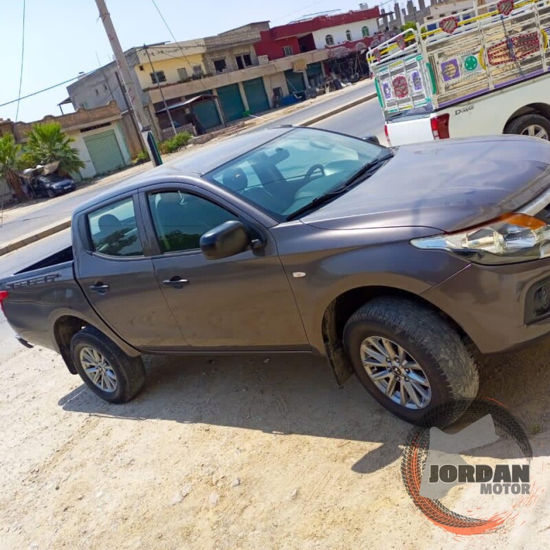 بك اب دودج رام قصة ميتسوبيشي