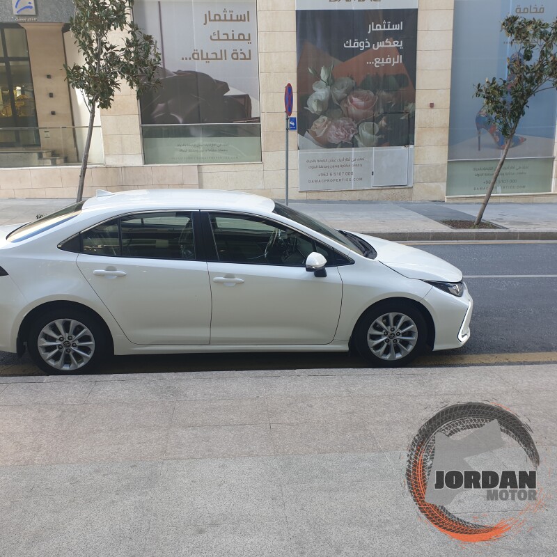 تويوتا كورولا للبيع هابيرد ٢ جيد ٢ مضروب امامي ياباني